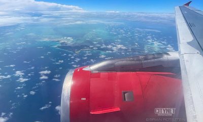 Airplane view of the sky and engine.